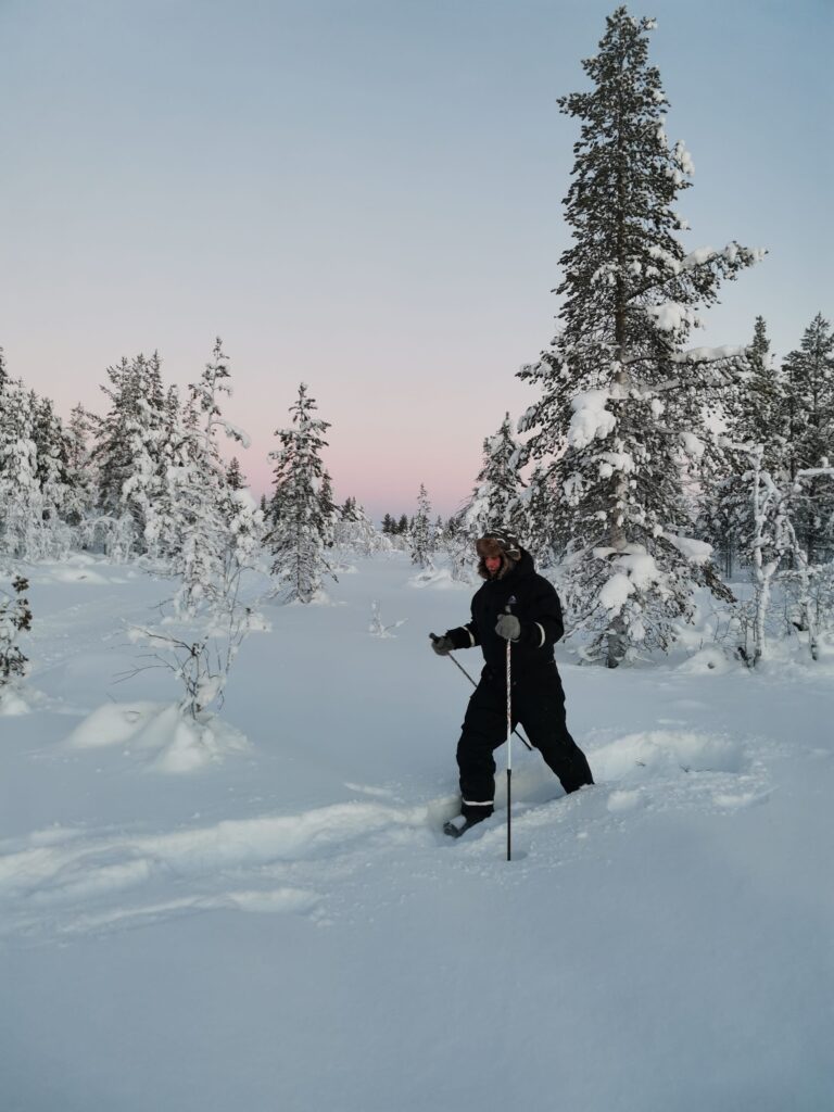 A man snowshoeing in Enontekiö Lapland.