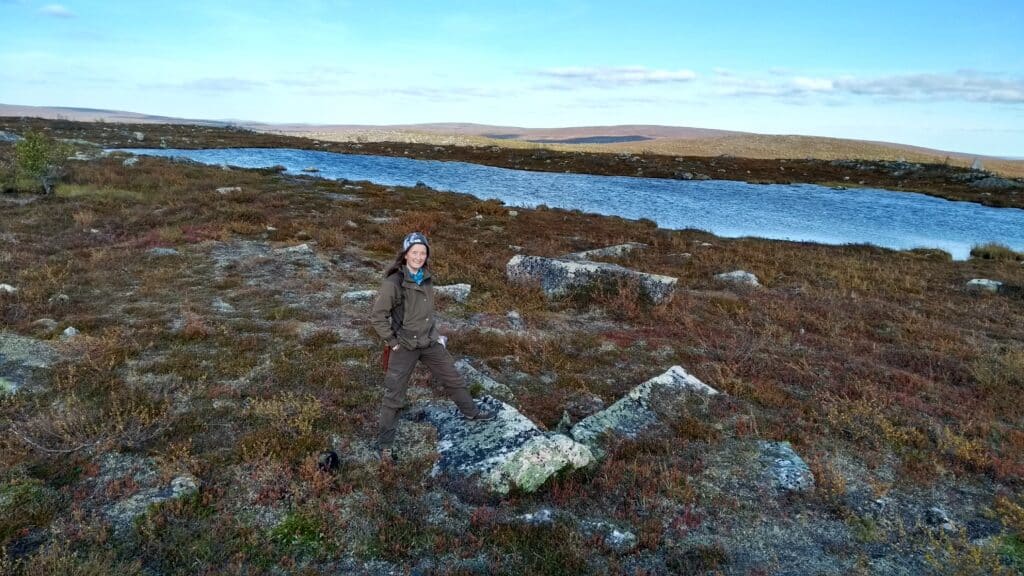 A woman hiking in lapland wilderness,open tundra, Hetta Enontekio,